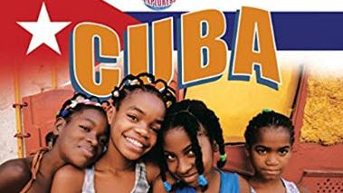 Four Cuban girls smiling at camera