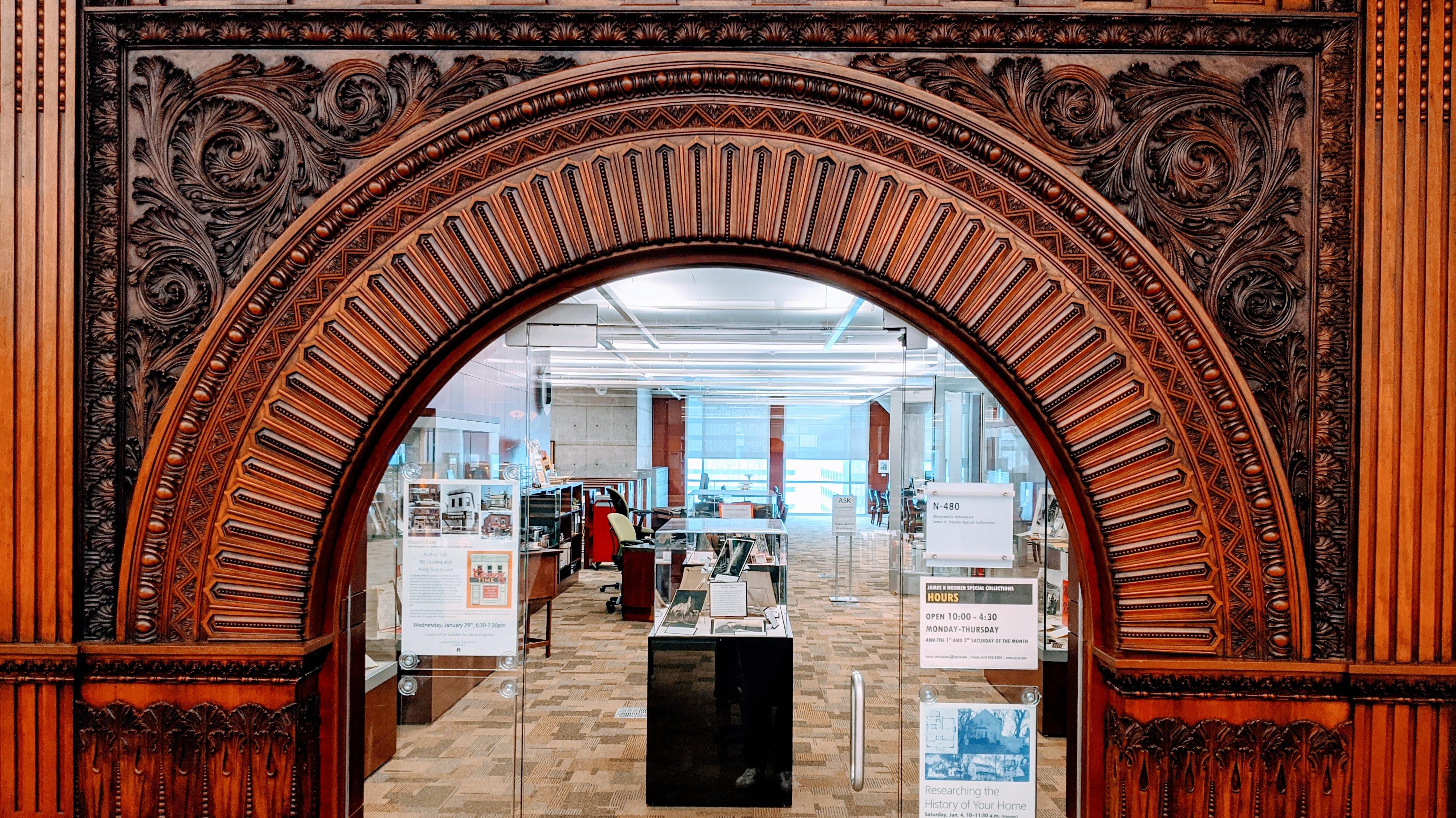 A photograph of a grand wooden arch at the Minneapolis Central Library.