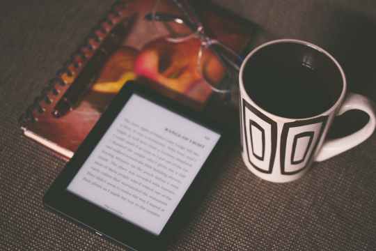 ebook reader with coffee mug