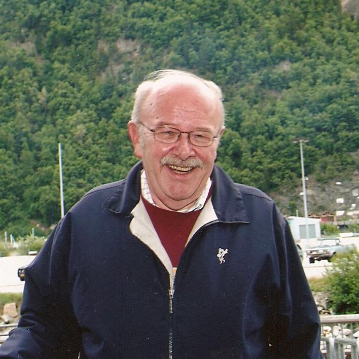 A photograph of a smiling Bill Asp.